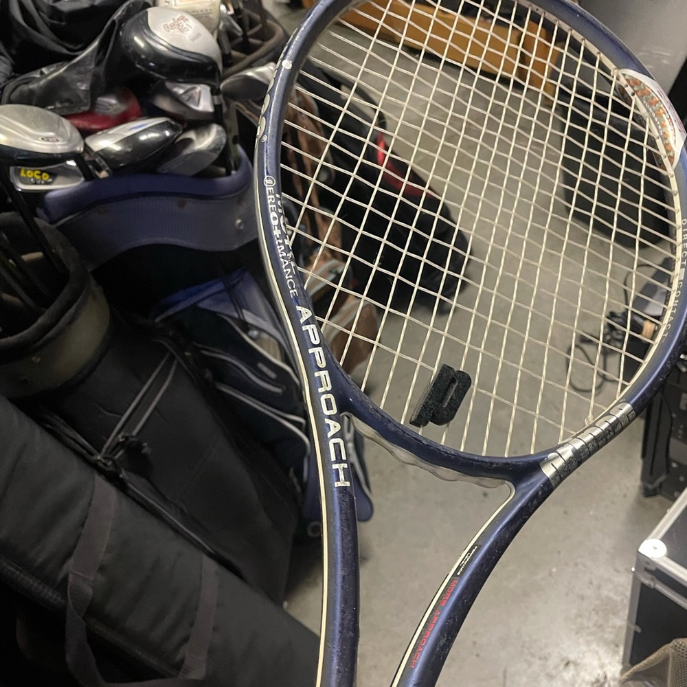 Prince Approach tennis Racquet 27 inc 
With new fashion grip
